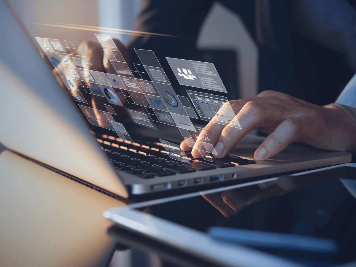 cyber security maturity assessment icons floating on laptop keyboard
