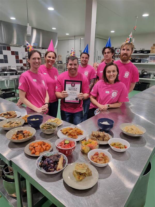 Sentaris team holding certificate of appreciation