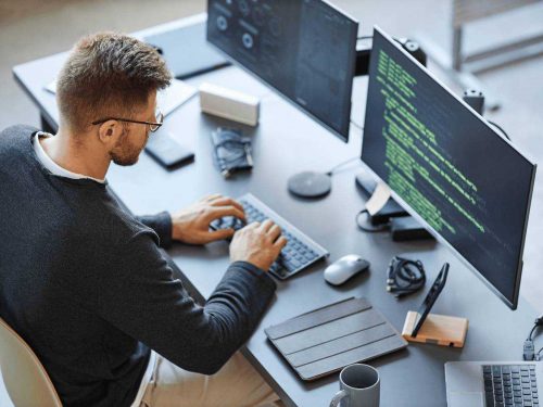 Cyber security engineer working at his desk